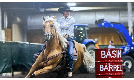 Renown Radiation Therapist Haley Longfield on her horse Hershey at a barrel race