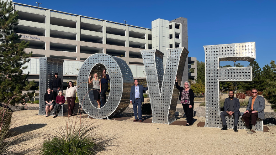 Renown Health's Legal team poses at the LOVE sign at Renown Regional Medical Center.