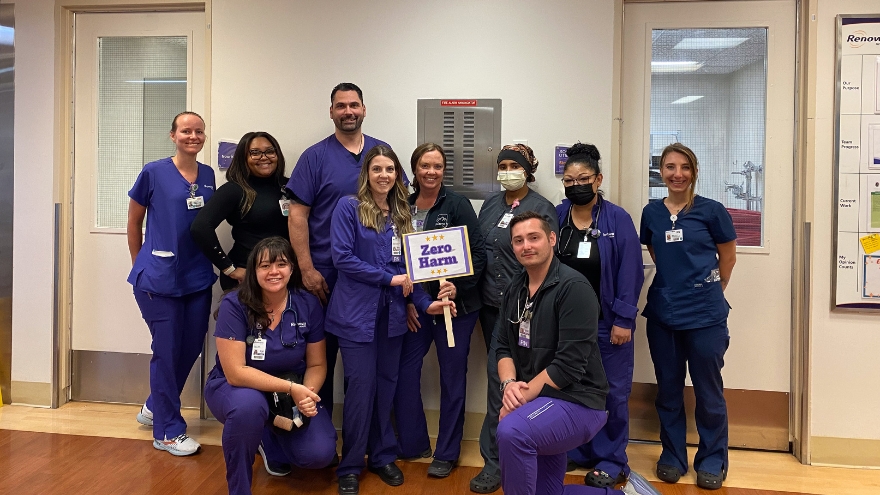 Med-surg nurses at Renown Regional pose with a "Zero Harm" sign.
