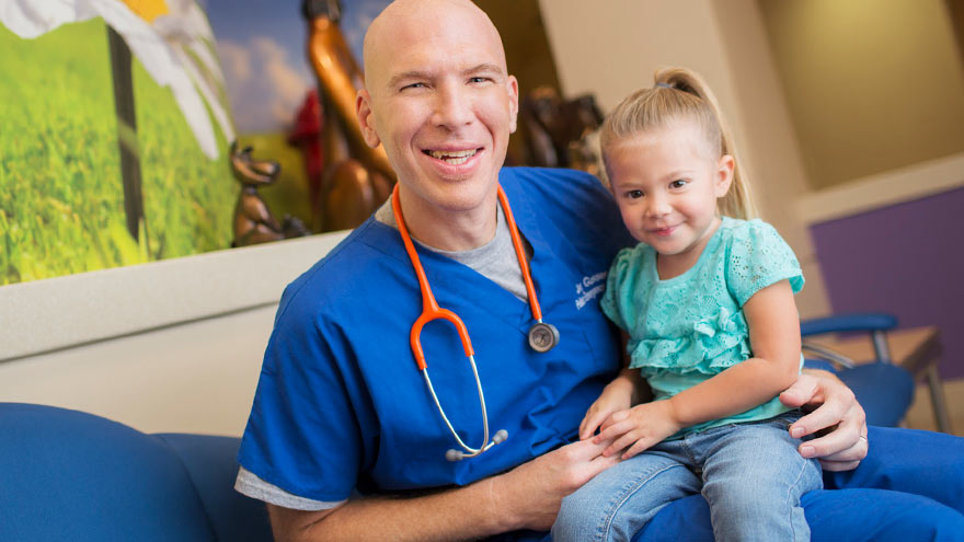  Joseph A. Gassen, M.D., with little patient at Renown Children's Hospital