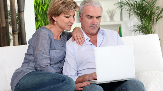 Couple looking at MyChart on laptop