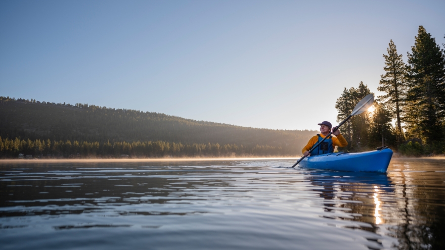 Kayaker padding on Lake Tahoe