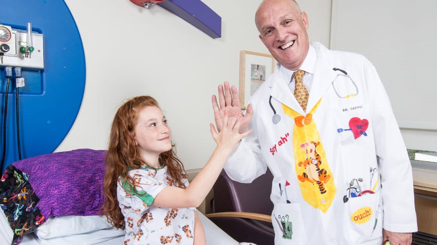 doctor max coppes with pediatric patient